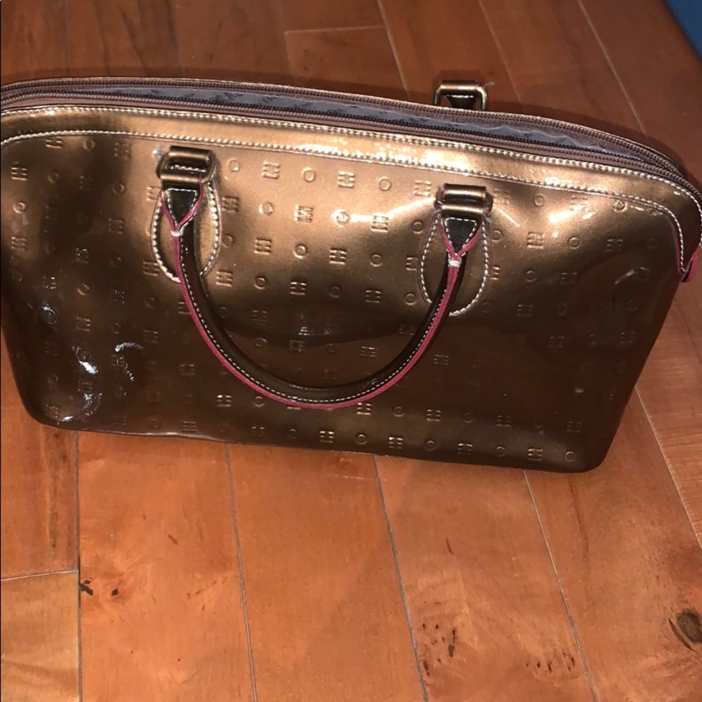 Like new bronze Arcadia purse